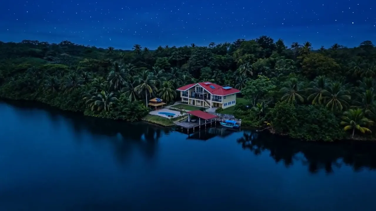 Coconut Coast Villa at night, seen from the water, Bocas del Toro, Panama